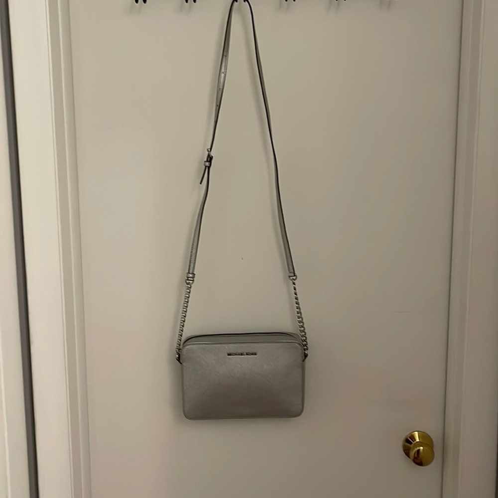 Michael kors metallic silver purse.